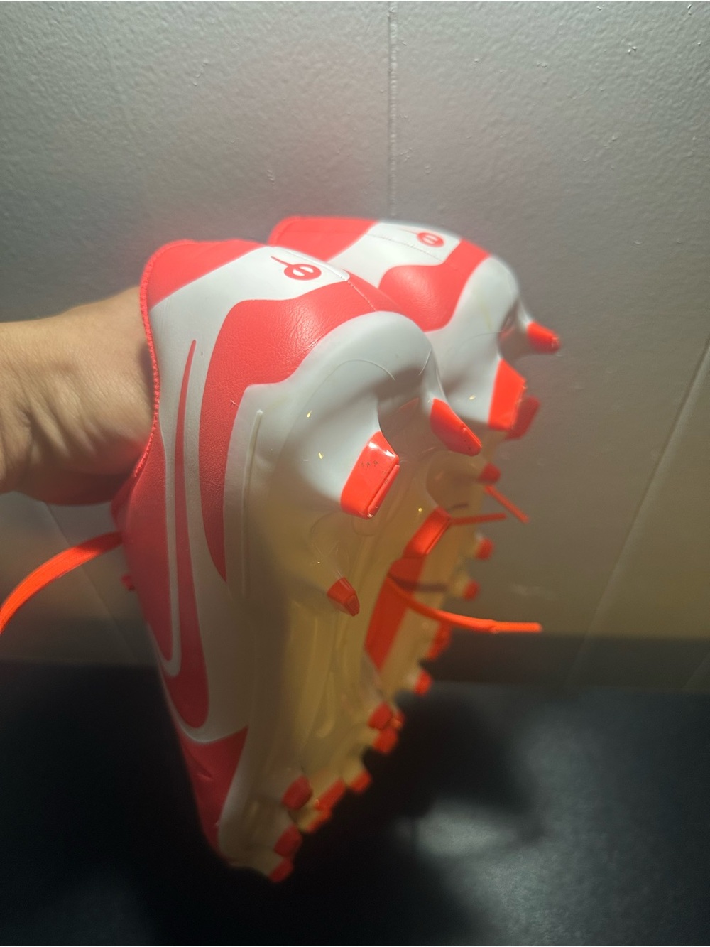 Nike mens Soccer Cleats in Vibrant Coral-Orange with White Swoosh - Picture 6 of 6